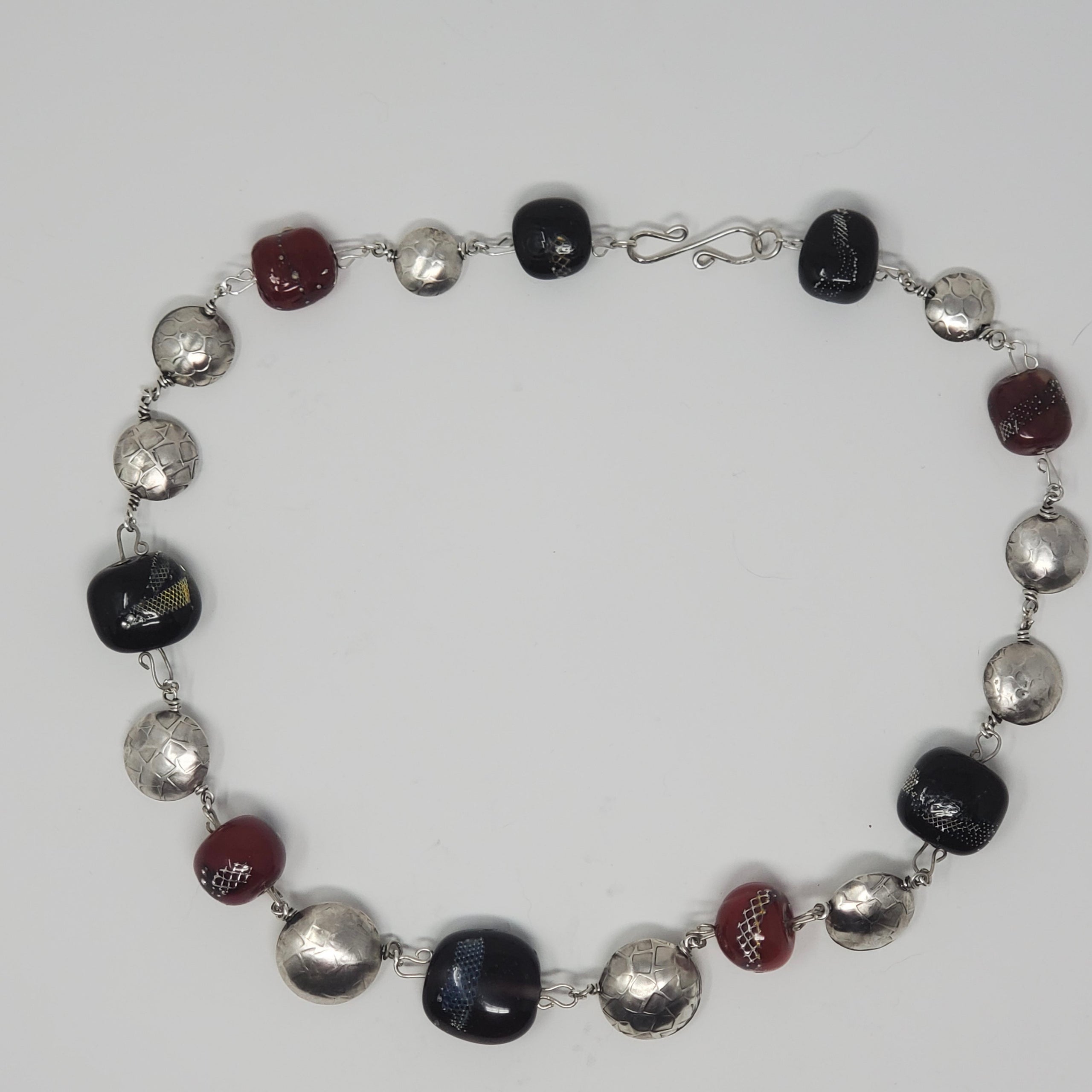 Black, Red, and silver Beads